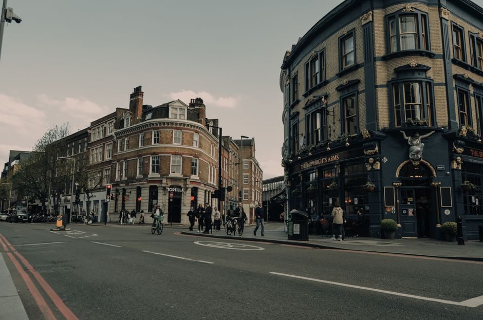 London street with traditional buildings and pedestrians